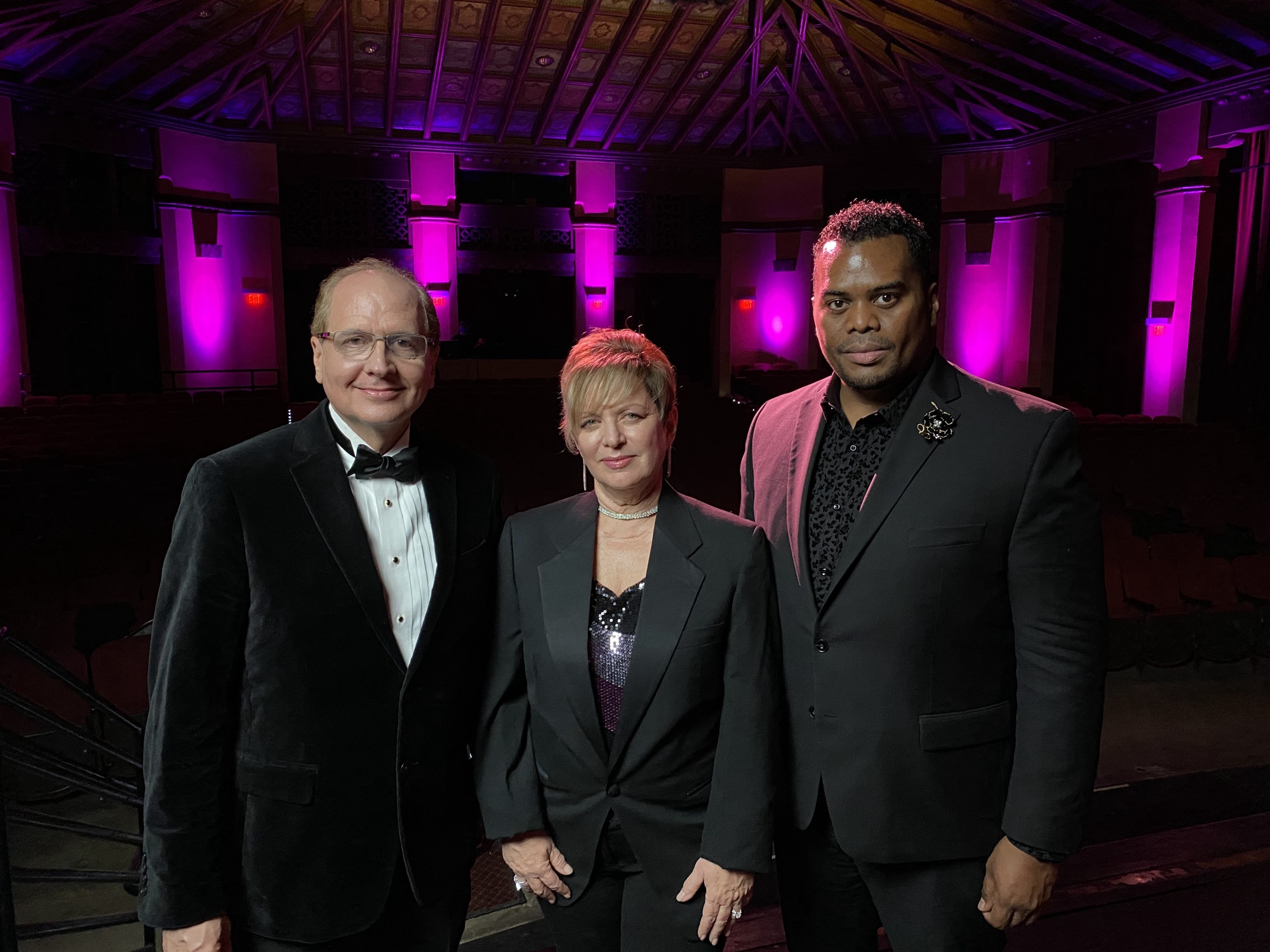 Dean McVay, Dr. Anne Viricel, and Anthony Parnther at the California Theatre.